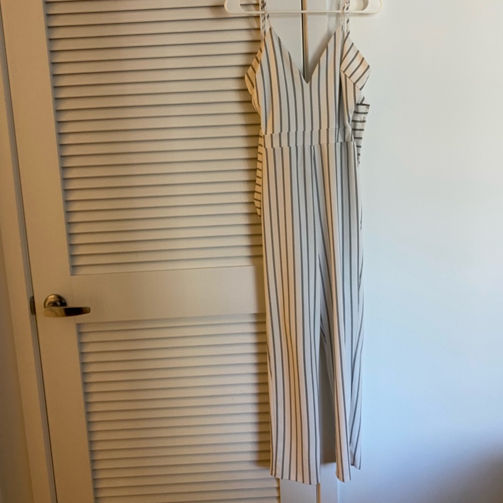 Black & white striped jumpsuit. Tye-back